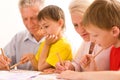 Elderly couple with their grandchildren Royalty Free Stock Photo