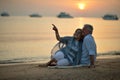 Elderly couple at tropical beach Royalty Free Stock Photo