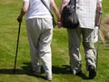 Elderly couple walking