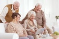Elderly couples looking at laptop Royalty Free Stock Photo