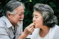 Elderly Couples eating some fruit