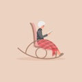 Elderly cute woman is sitting in a rocking chair.Old lady covered her feet with checked woollen plaid.Cartoon granny is resting in Royalty Free Stock Photo