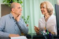 Elderly female doctor talking with mature male patient Royalty Free Stock Photo