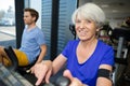 Elderly fit woman in gym Royalty Free Stock Photo