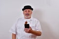 Elderly gentleman with his smartphone Royalty Free Stock Photo