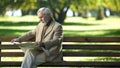 Elderly gentlemen reading news, thinking about political situation, outdoors Royalty Free Stock Photo