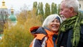 Elderly gray-haired optimistic couple