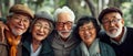 Elderly Group Embraces Joyously, Showcasing Their Diverse Unity, Standing United Royalty Free Stock Photo