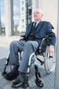 elderly handicapped man outdoors