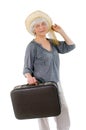 Elderly happy woman with a retro suitcase for travel. leisure hobby. Grandma, Mom. Active pension. Birthday, Mother`s Day, Family