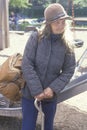 Elderly homeless woman holding cane, Chicago, Illinois