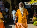 An elderly Indian man with a beard