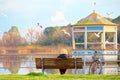 Elderly lady on a bench by the lake Torre del Lago Puccini Royalty Free Stock Photo