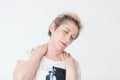 Elderly lady in excruciating neck tention