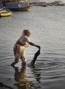Elderly Lady in the Ganges Royalty Free Stock Photo