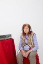 Elderly lady listening to the radio