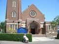 Lady in wheelchair outside church