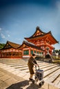 Elderly lady on temple precinct