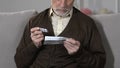 Elderly male reading pills dosage, side effect and precautions, pharmacology