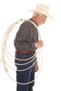 Elderly man cowboy rope side