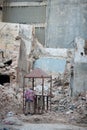 Elderly Man in a Crumbling Building Site Royalty Free Stock Photo