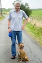 Elderly man with dog Royalty Free Stock Photo