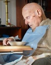 Elderly man drops off to sleep while eating his lunch,England,United Kingdom