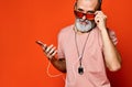 An image of an elderly man listening to music with headphones Royalty Free Stock Photo