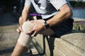 Elderly man having a knee injury Royalty Free Stock Photo