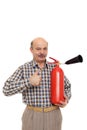 Elderly man is holding a red fire extinguisher. Royalty Free Stock Photo