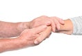 Elderly man holding woman`s hand on white background. Royalty Free Stock Photo