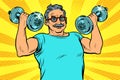 Elderly man lifts dumbbells, fitness sport Royalty Free Stock Photo