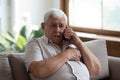 Elderly man makes emergency call having heart attack symptoms