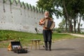 An elderly man playing the russian accordion. Suzdal, Russia