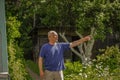 An elderly man points his hand in the countryside Royalty Free Stock Photo