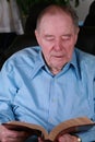 Elderly man reading Bible Royalty Free Stock Photo