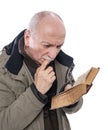 Elderly man reading holy bible Royalty Free Stock Photo