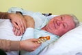 Elderly man receiving medication Royalty Free Stock Photo