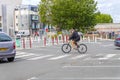 Elderly man rides a bicycle in La Rochelle, France