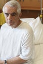 Elderly Man Sitting On Hospital Bed Royalty Free Stock Photo