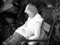 Elderly Man Sleeping On A Bench In Sofia Downtown, Bulgaria