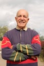 An elderly man smiling in the sun Royalty Free Stock Photo