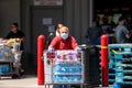 People stocking up at Costco wearing gloves and face masks Coronavirus Covid 19 crisis pandemic Royalty Free Stock Photo