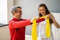 Elderly Man Stretching Rehab Physio Band Royalty Free Stock Photo