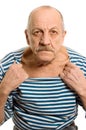 The elderly man in a stripped vest
