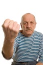 The elderly man threatens with a fist Royalty Free Stock Photo