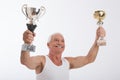 Elderly man with trophies