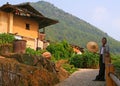 Elderly man, typical representative of the ethnic Hakka, near his house