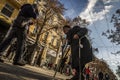 Old badly dressed man with a cane in his hand asking for money in street photography in Burgas/Bulgaria/12.06.2018/