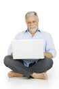 Elderly man using laptop